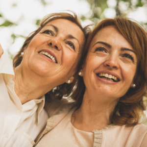 A woman and her elder mom laughing